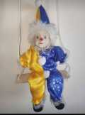 Hintázó porcelán bohóc 50 cm 