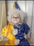 Hintázó porcelán bohóc 50 cm 