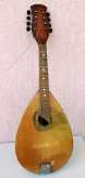 Portugál mandolin nyolc húros hibás hiányos áll. Portugál mandolin nyolc húros hibás hiányos áll.